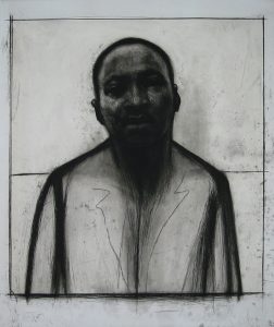 John Wilson’s “Martin Luther King Jr.” etching is displayed in the ArtSpace as part of the “30 Years of Printmaking” Exhibit featuring artists affiliated with the Center Street Studio in Milton.