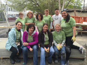 Front: Align employees Maria Noya, LeeAnne Powers, Jessica Daigenault and Sue Gill. Back: Align employee Joanne McCarthy, Habitat Executive Director Brenda Gould, Habitat Development Director Kim Trainor, Align employee Lauren Robinson and Habitat Construction Manager Scott Carpenter.